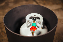Fire Pit Art Filling Station beside a fire pit
