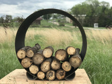 Fire Pit Art Orbit round steel log rack