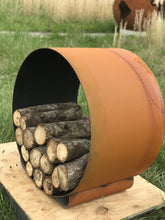 Fire Pit Art Orbit log rack outdoor setting